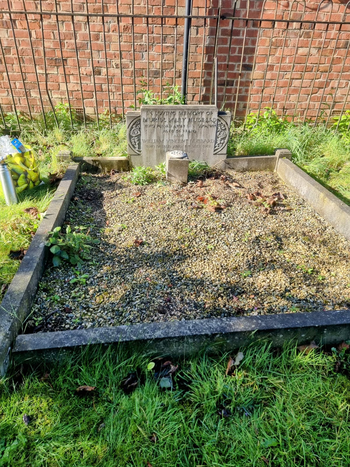 Before grave cleaning - weathered and neglected headstone
